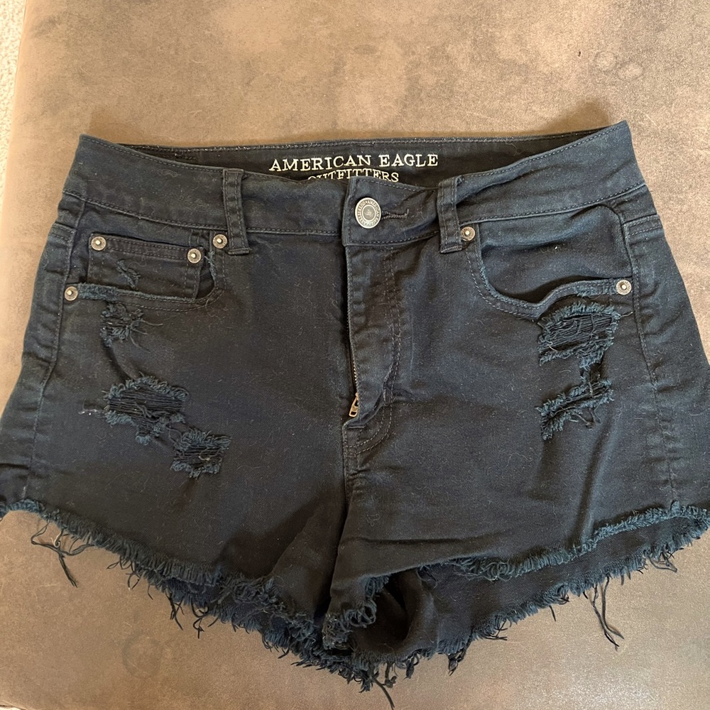 American Eagle black denim distressed shorts.